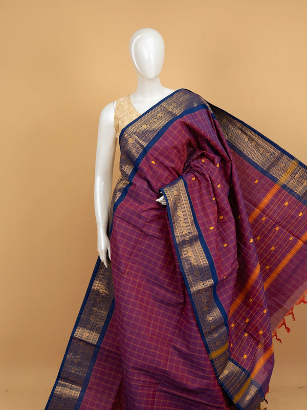 Purple Chettinad cotton saree with blue gold zari contrast border and yellow paisley buttas