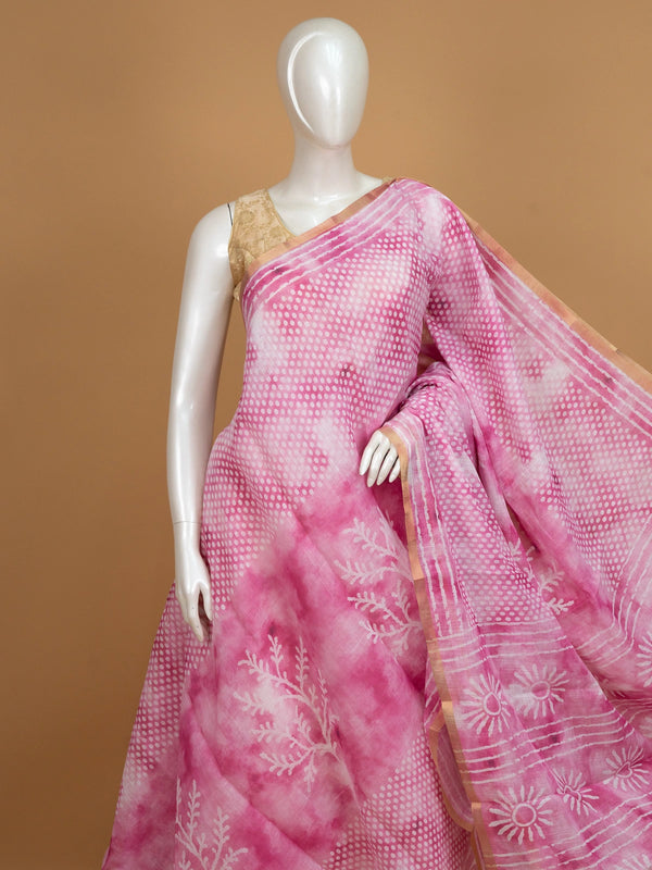 Pink and white linen cotton saree with shibori dot pattern, floral pallu and gold zari border