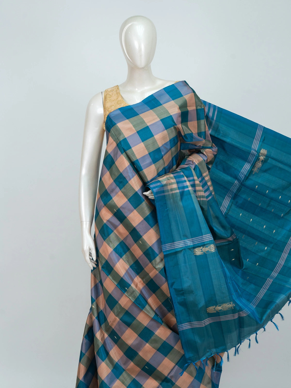 Teal blue and peach checked banana silk saree with contrast zari pallu