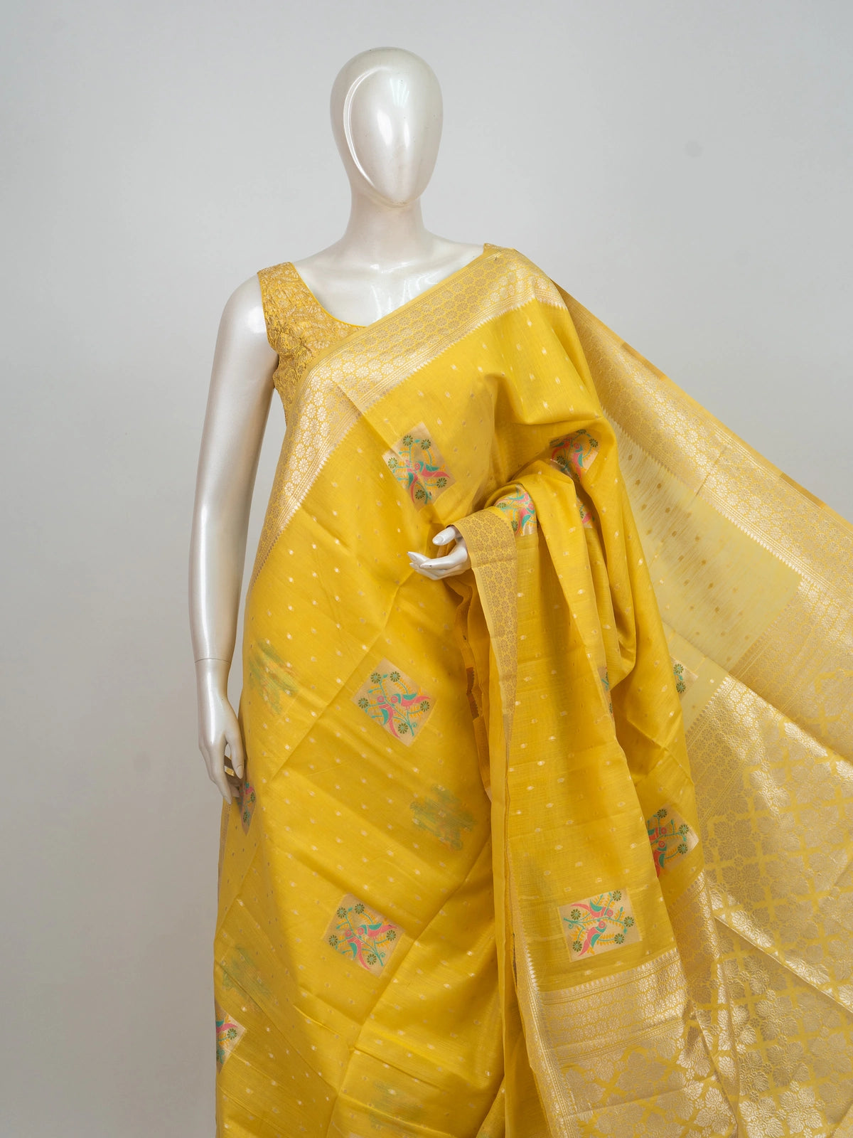 Bright yellow linen cotton saree with silver butis, multicolour bird motifs and gold zari border