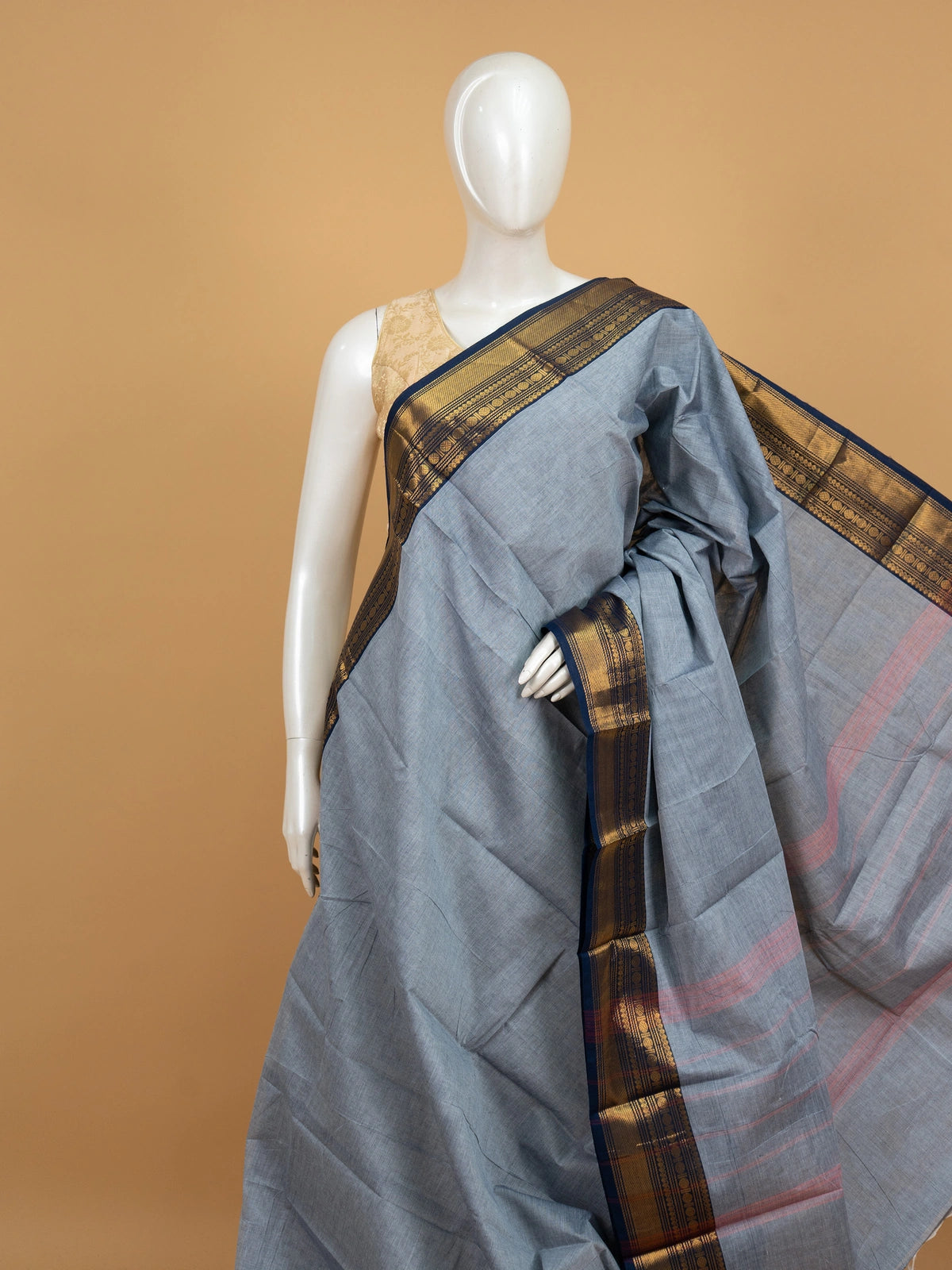 Grey Chettinad cotton saree with contrast navy blue and gold zari border
