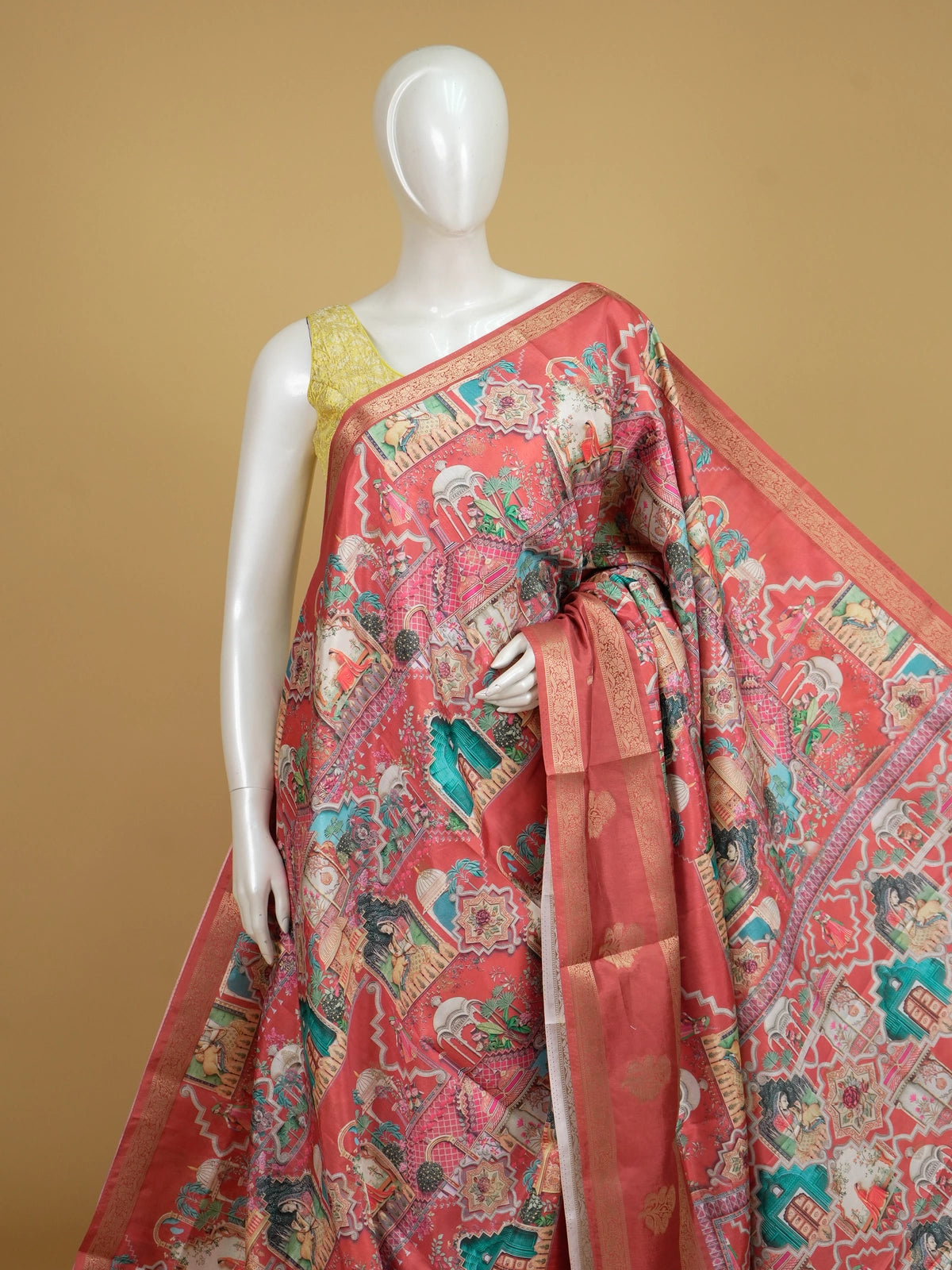 Coral pink Dola silk saree with Mughal-inspired multicolour print and gold zari border