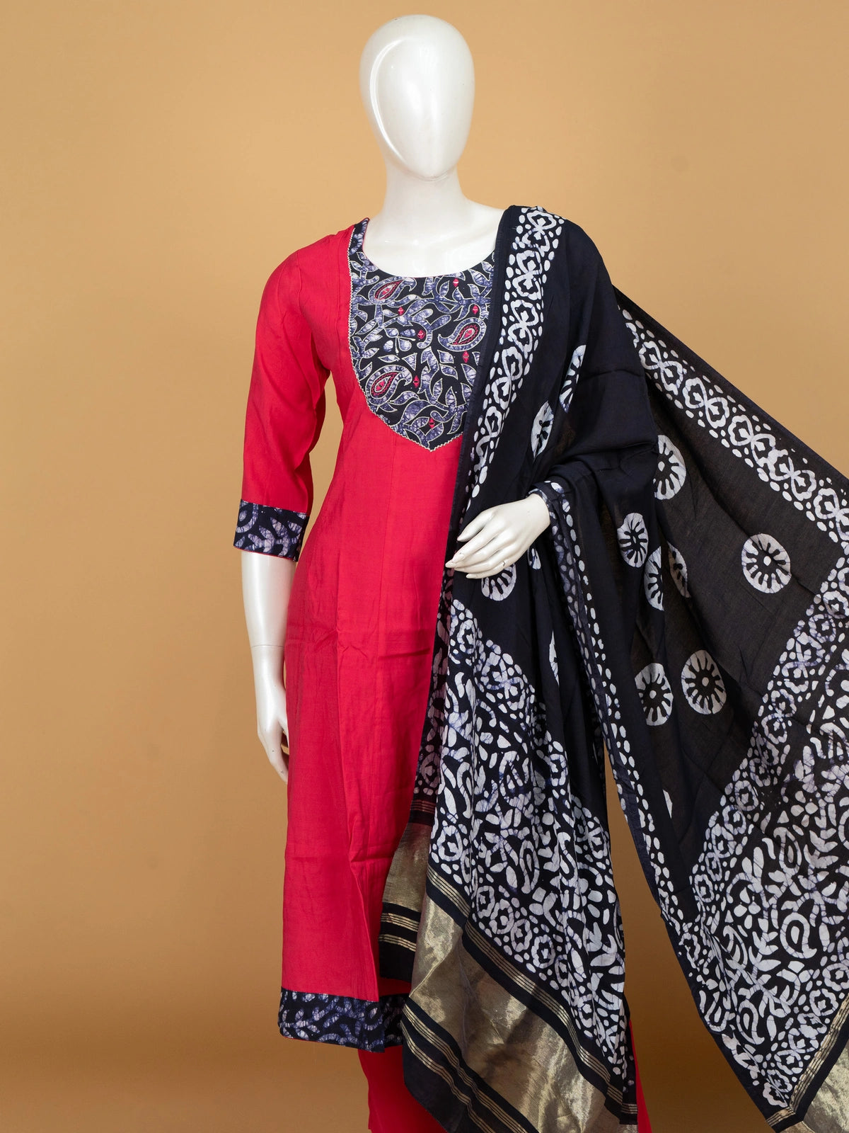 Red cotton A-line kurti set with navy batik embroidered yoke and black batik dupatta