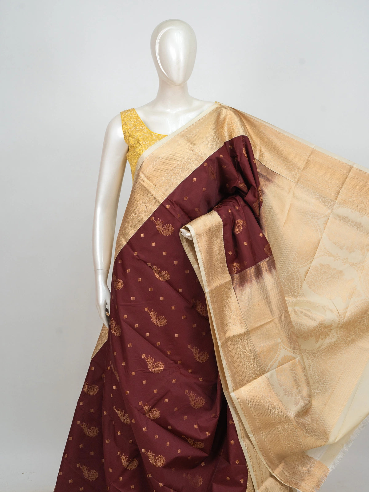 Maroon and cream semi silk saree with gold zari paisley motifs and contrast cream floral zari border