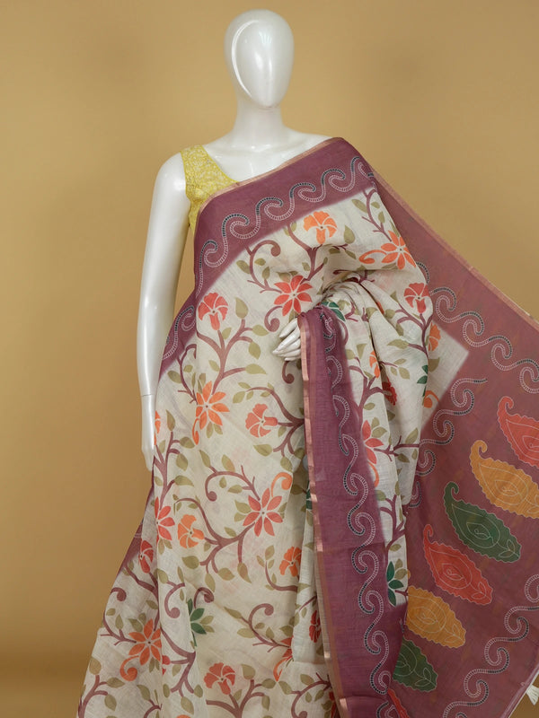 Cream linen cotton saree with floral print and onion-pink paisley border