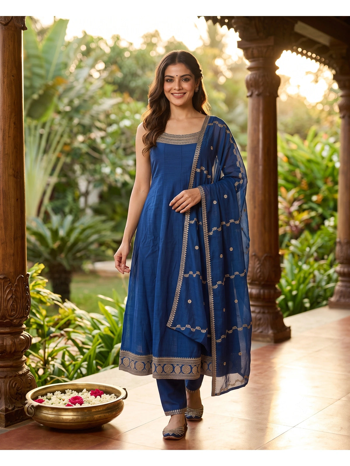 Royal Blue sleeveless A-line kurti set with gold Zari embroidery and matching dupatta