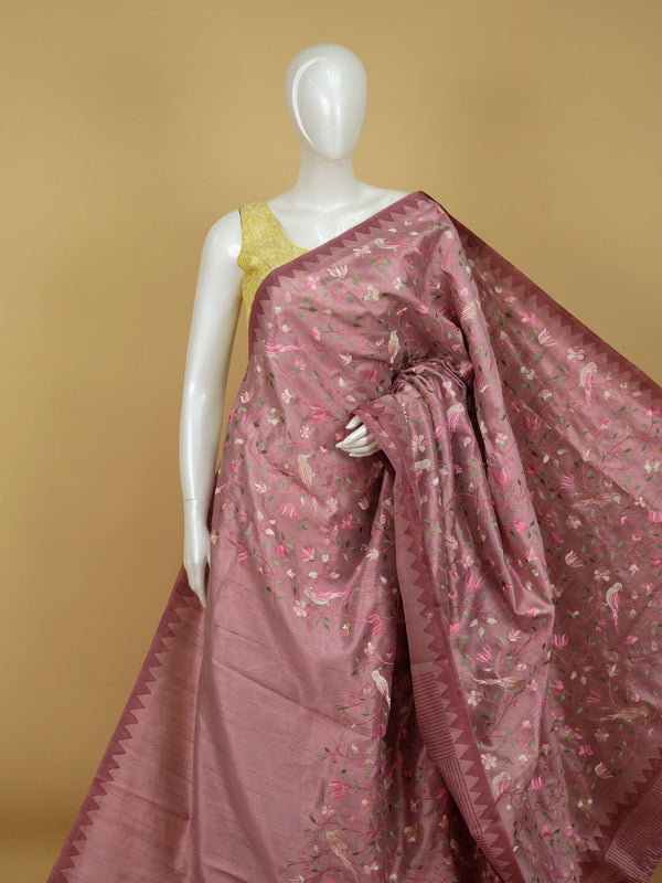 Dusty rose pink designer saree with floral and bird thread embroidery and temple border