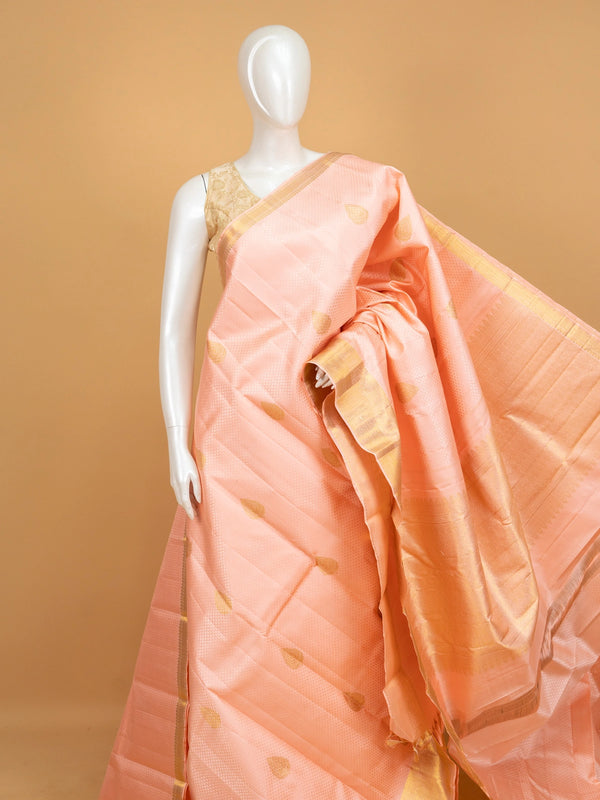 Peach pure Kanchipuram silk saree with gold zari buttas, contrast zari border and woven pallu