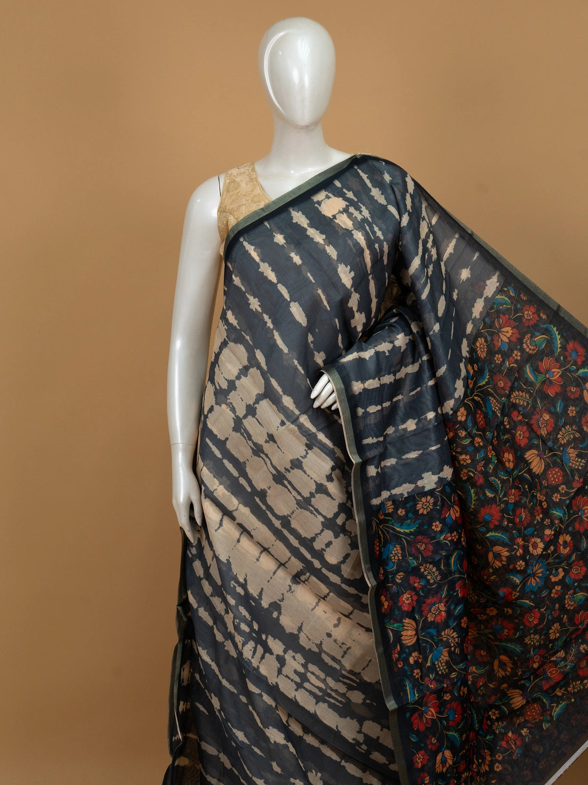 Charcoal grey shibori linen cotton saree with colourful floral pallu and green border