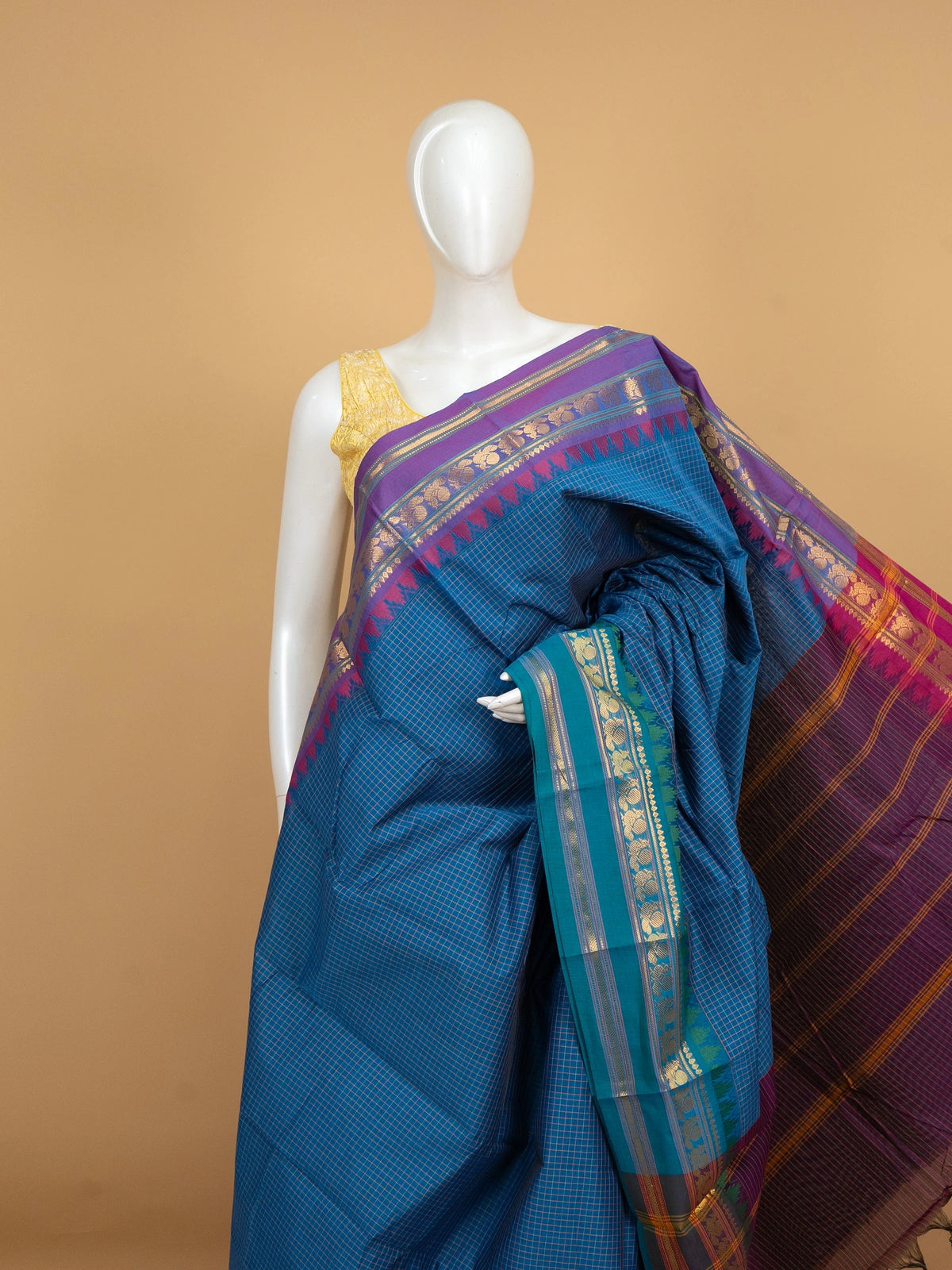 Peacock blue Chettinad cotton saree with purple and teal contrast zari borders and striped pallu