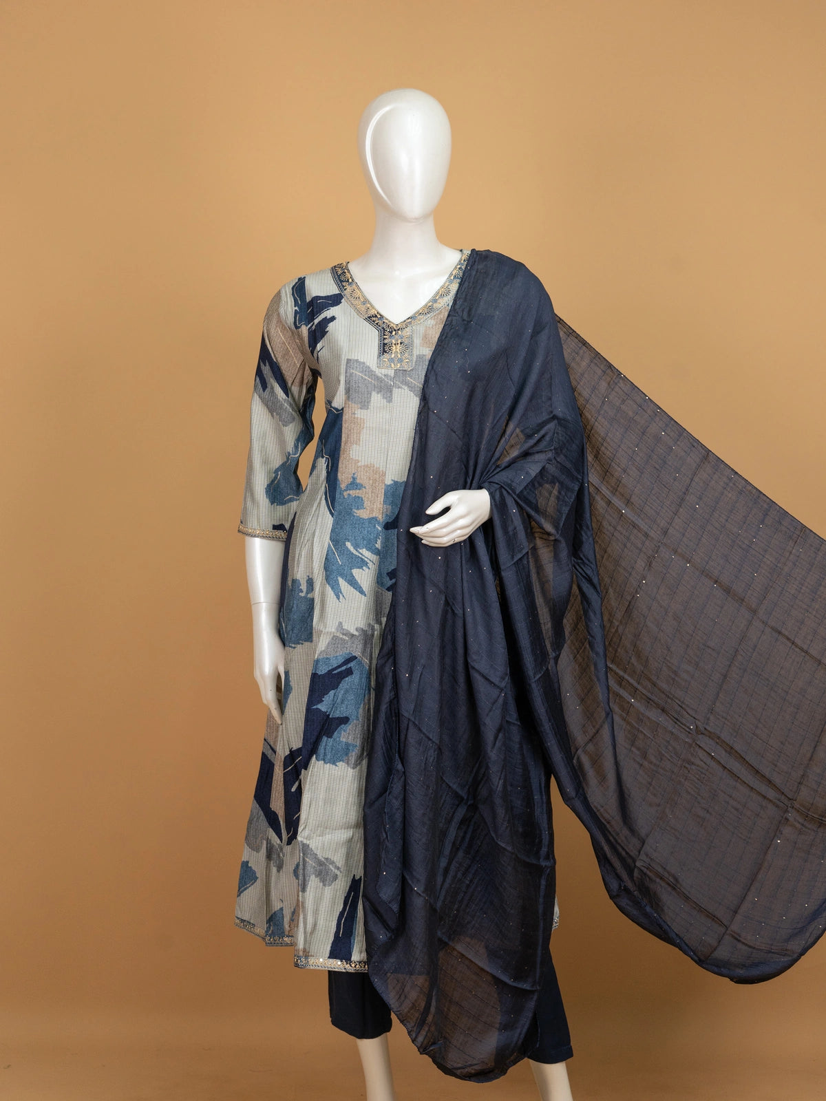 Cream and blue abstract print A-Line kurti set with zari embroidered neckline and navy dupatta