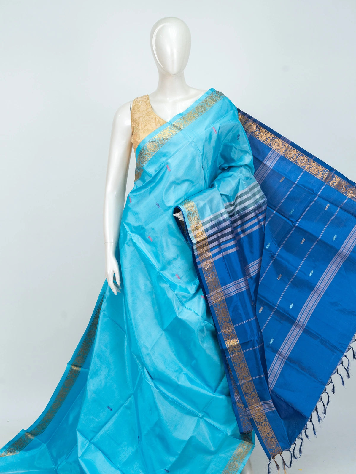 Sky blue banana silk saree with royal blue contrast pallu and gold zari border