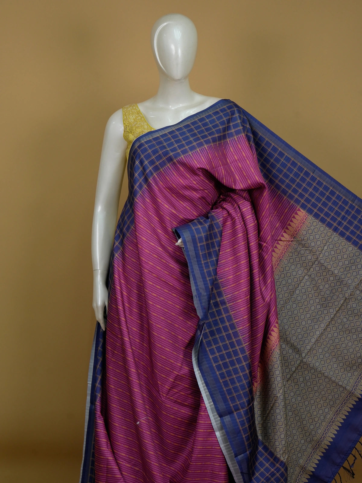 Magenta Dola silk saree with blue contrast zari border and woven geometric pallu