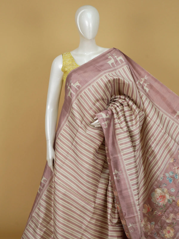 Dusty pink and cream designer silk saree with deer motifs and floral embroidered pallu