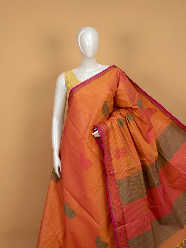 Orange and pink semi raw silk saree with paisley and elephant motifs and contrast woven border