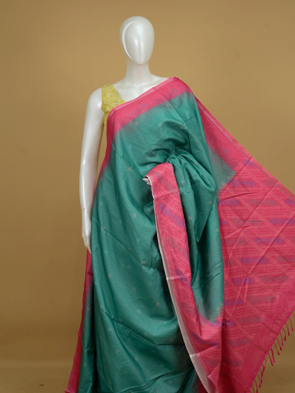 Teal green Dola silk saree with silver zari checks and contrast rani pink border and pallu
