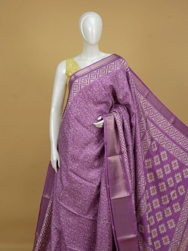Purple Dola silk saree with white Warli-style print, patola pallu and silver zari border
