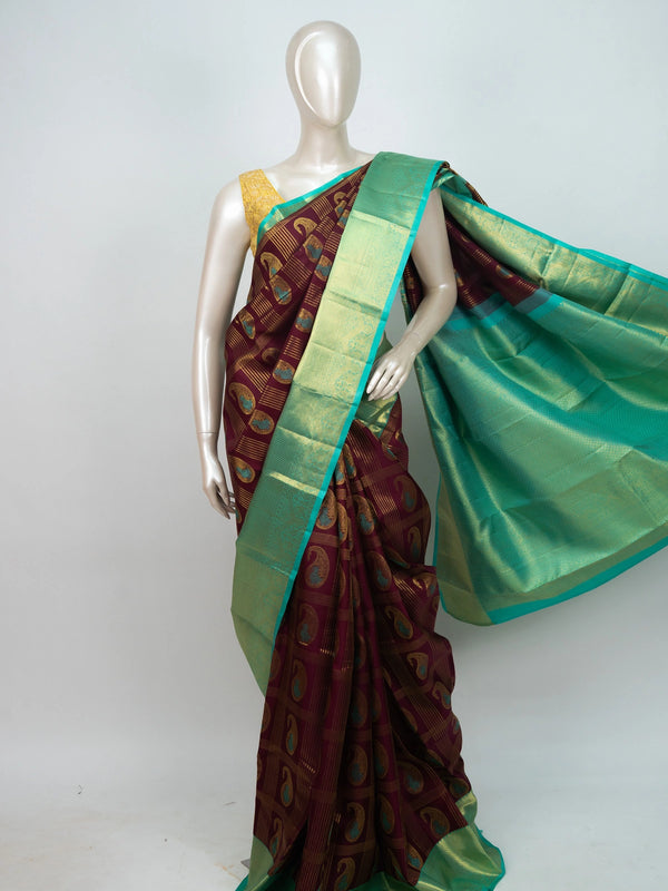 Maroon pure Kanchipuram silk saree with teal green contrast gold zari border and paisley motifs