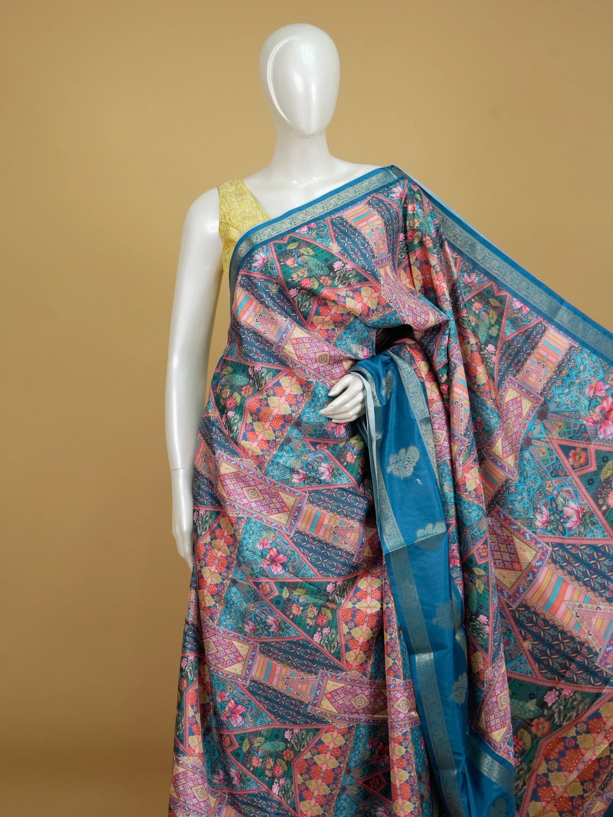 Teal blue and multicolour Dola silk saree with patchwork floral print and silver zari contrast border