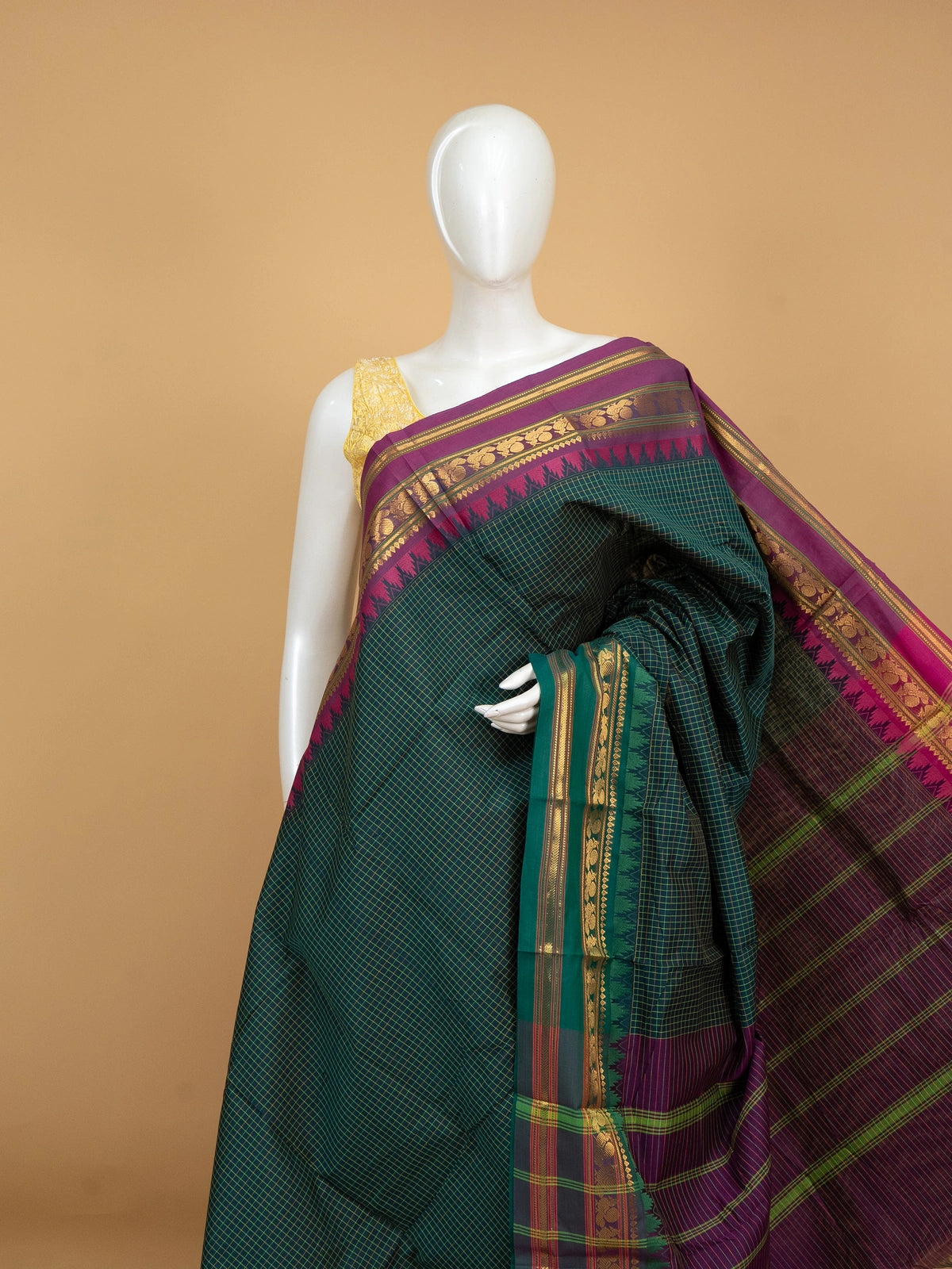 Dark green chequered Chettinad cotton saree with contrast magenta gold zari border and striped pallu