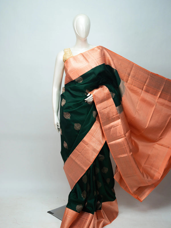 Bottle green pure Kanchipuram silk saree with contrast peach copper-zari border and pallu