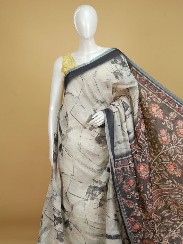 Cream and charcoal grey linen cotton saree with batik-style body print and Kalamkari peacock pallu