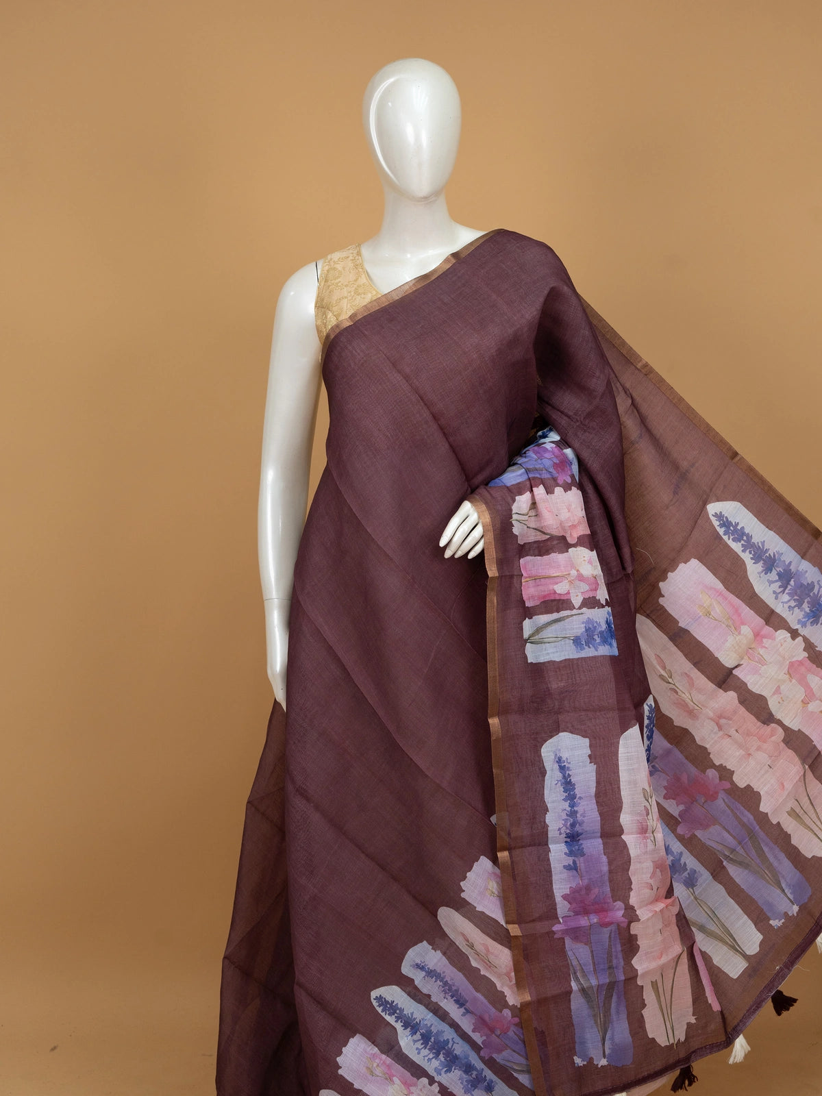 Mauve brown linen cotton saree with watercolour floral pallu and gold zari border