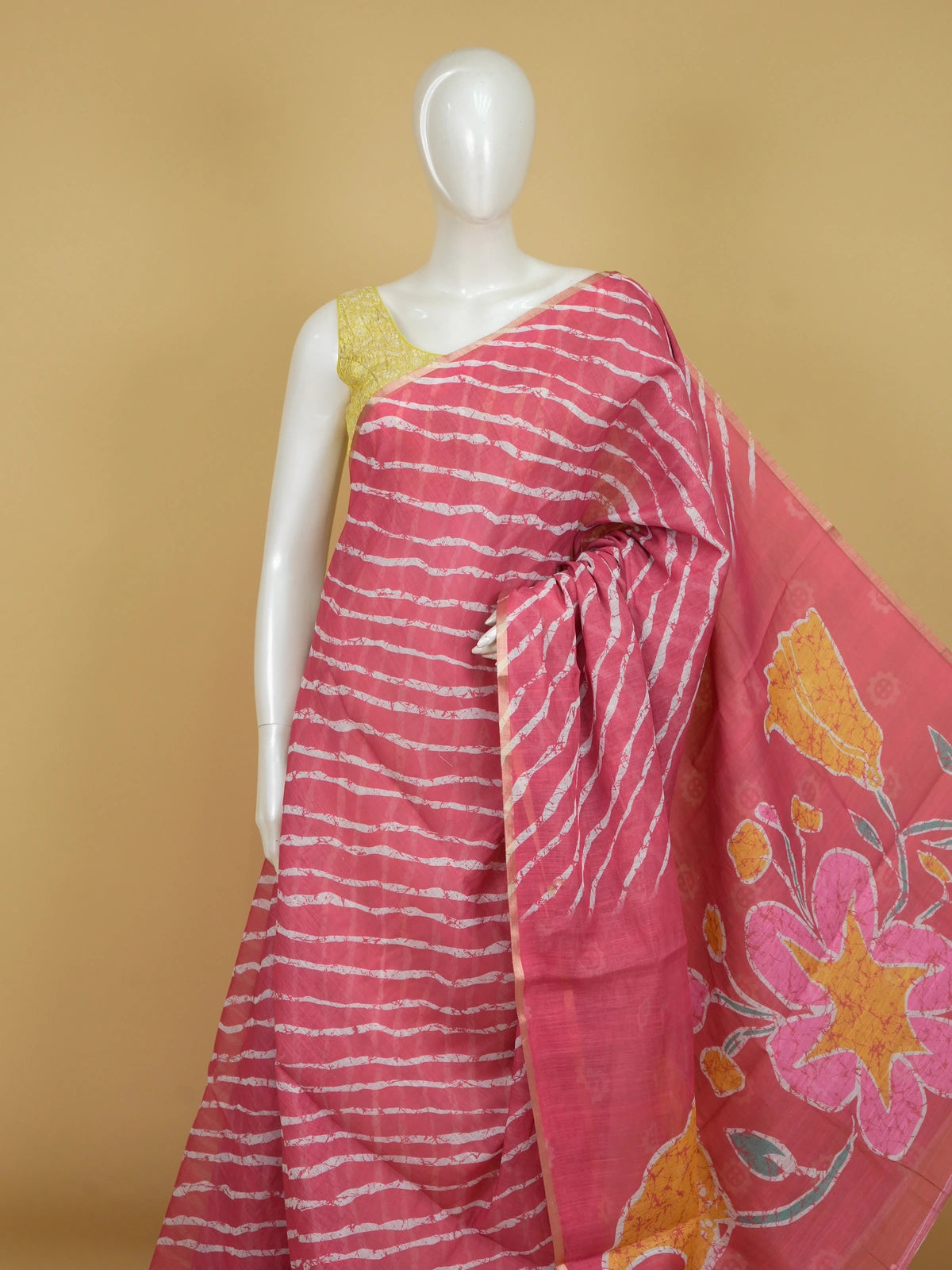 Pink and white leheriya linen cotton saree with batik floral pallu and gold zari border