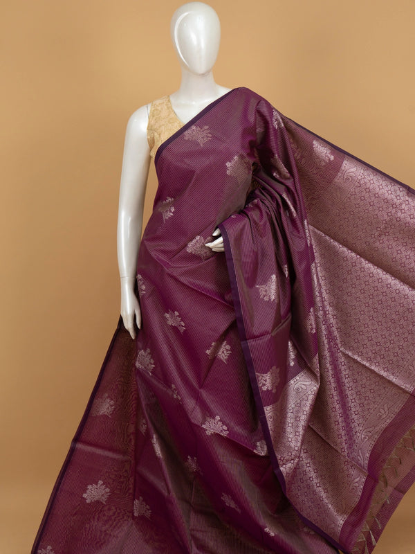 Wine purple silk cotton saree with silver zari floral buttas, contrast border, and ornate zari pallu