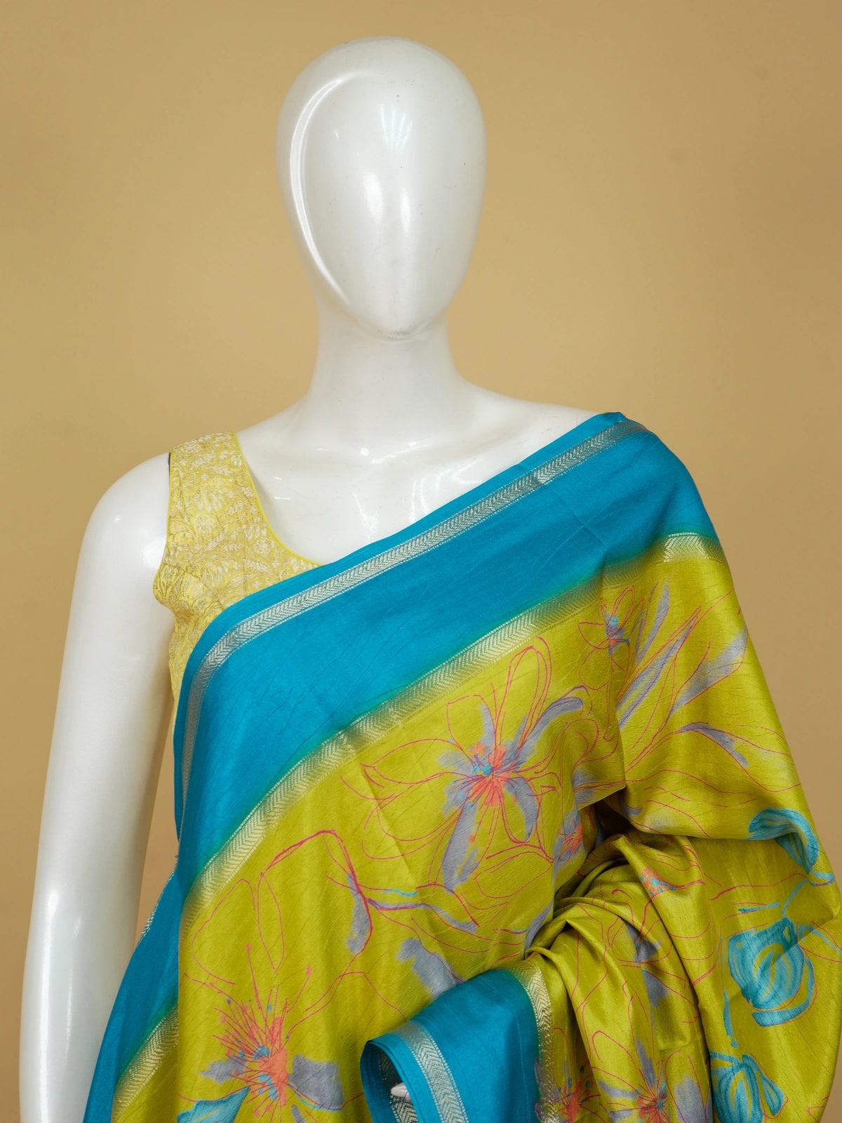 Lime green Dola silk saree with turquoise blue contrast border, silver zari and floral print