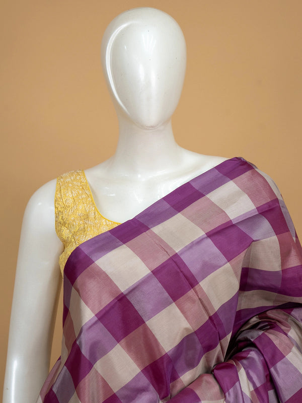 Magenta and cream checked banana silk saree with gold zari border and butta pallu