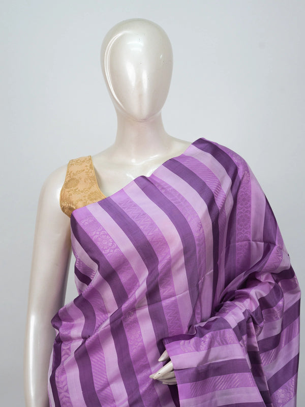 Purple striped soft silk saree with contrast teal pallu, gold zari buttis and tasselled edge