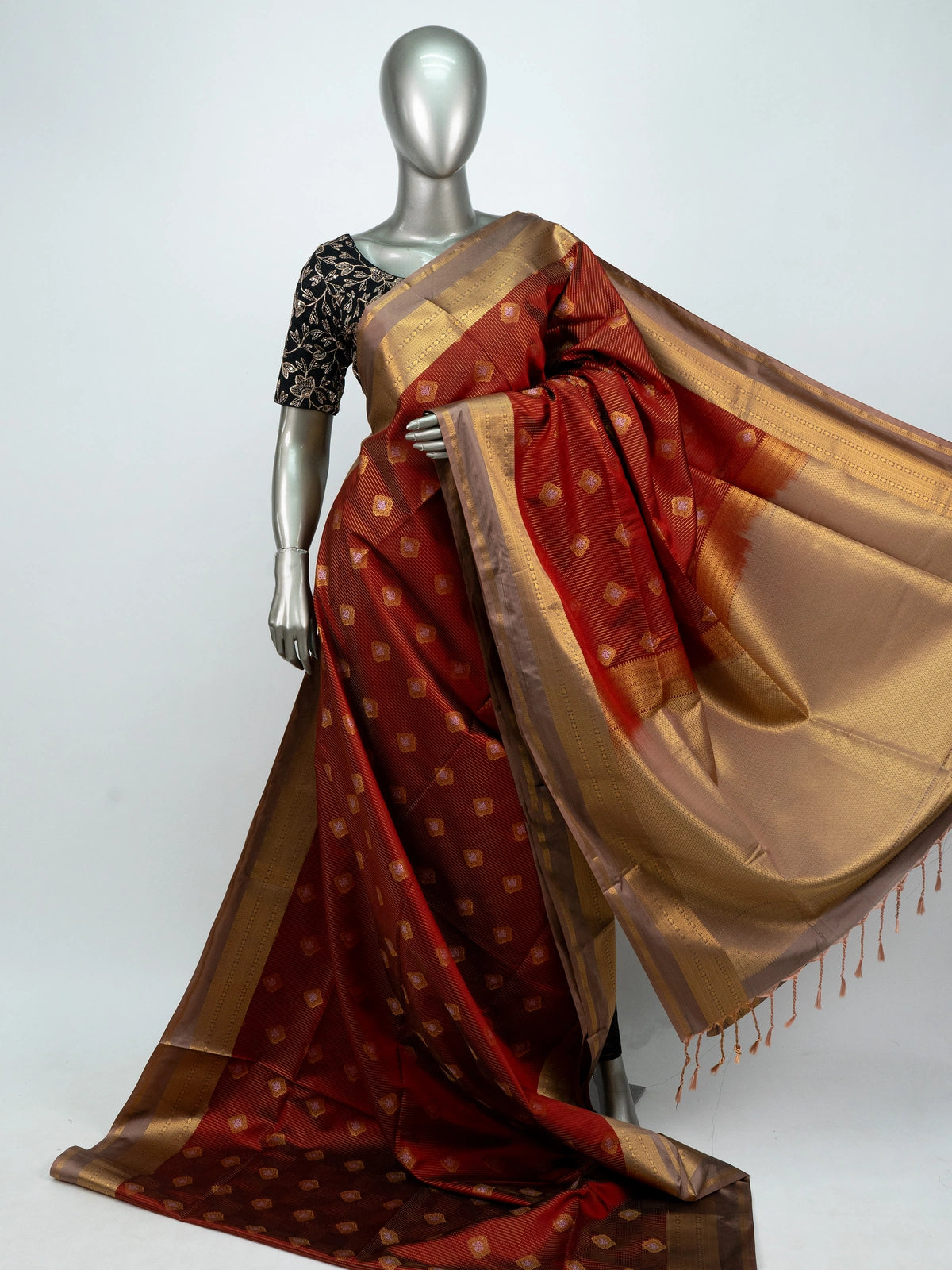 Maroon soft silk saree with gold zari buttas, contrast zari border and cream zari pallu