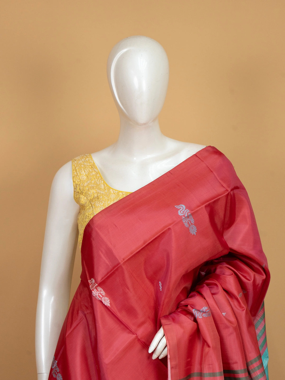 Rani pink banana silk saree with turquoise contrast pallu and woven butta motifs