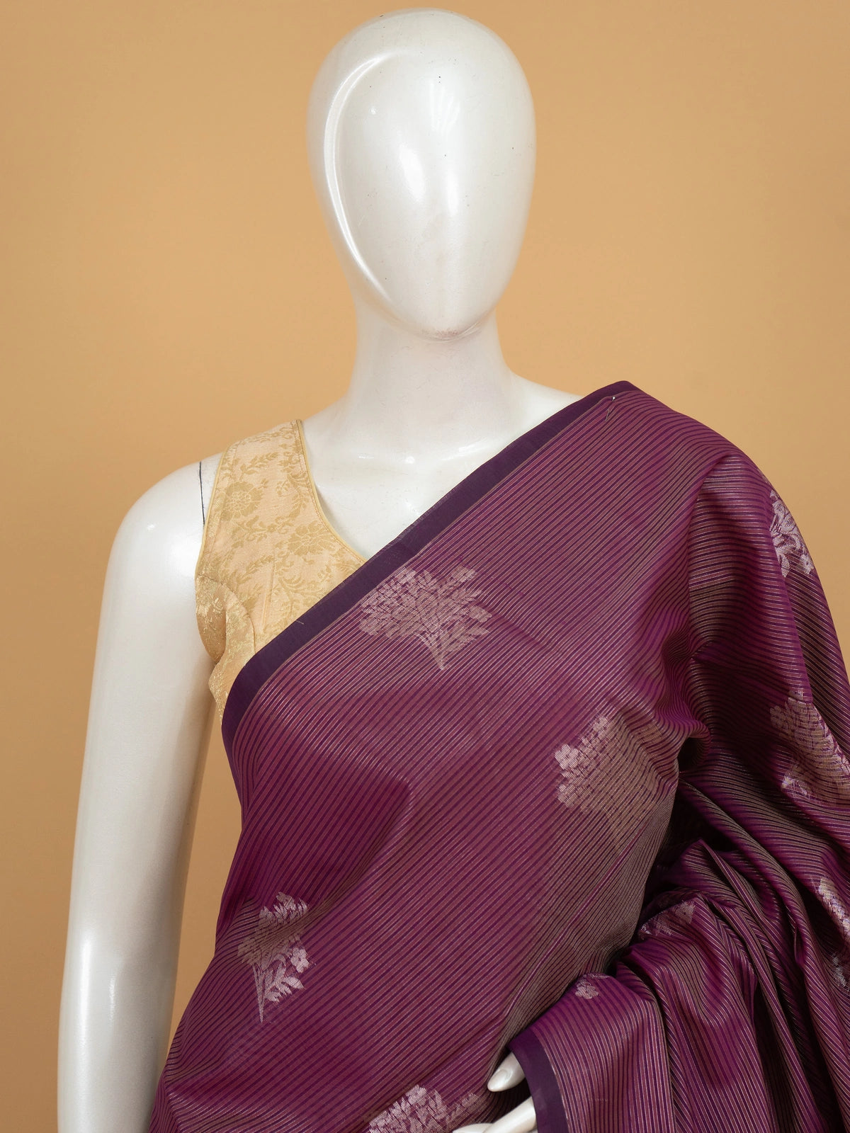 Wine purple silk cotton saree with silver zari floral buttas, contrast border, and ornate zari pallu