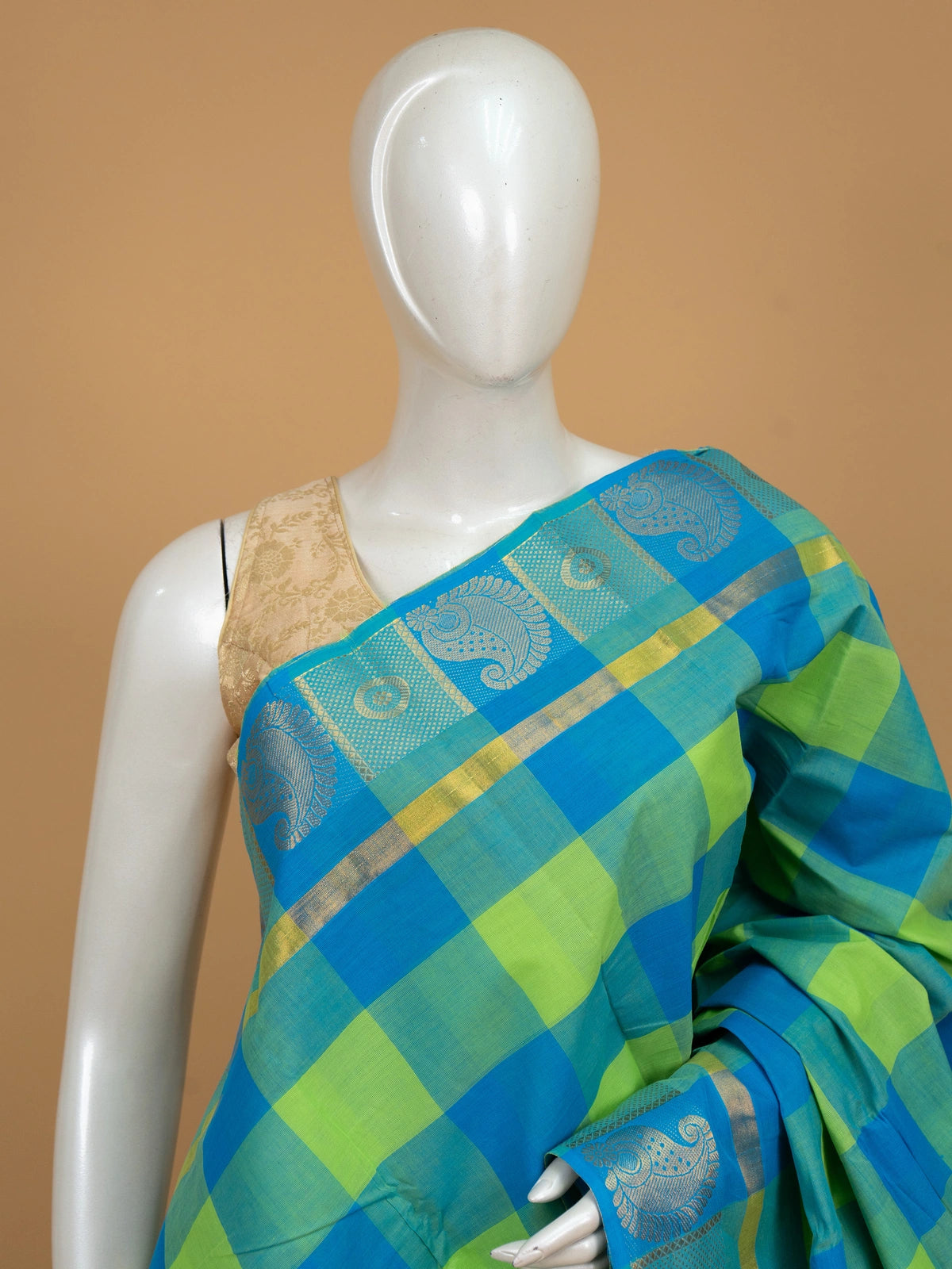 Blue and green checked Chettinad cotton saree with contrast gold zari paisley border
