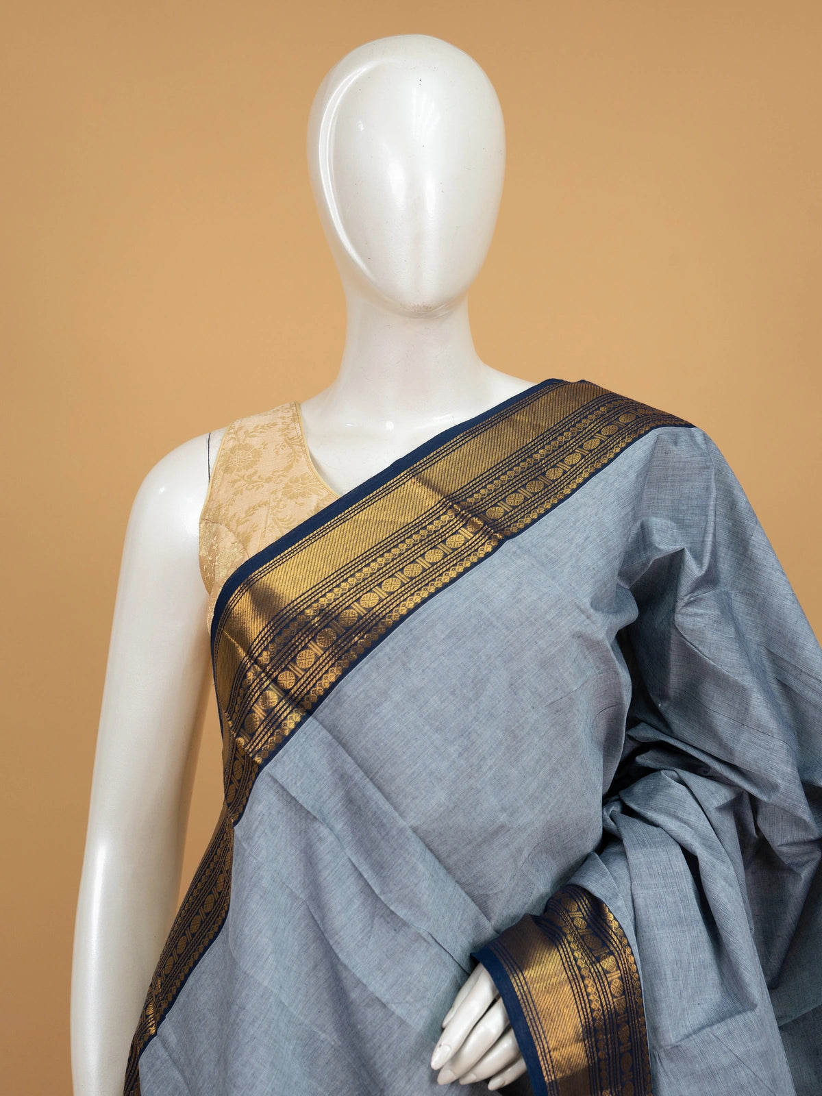 Grey Chettinad cotton saree with contrast navy blue and gold zari border