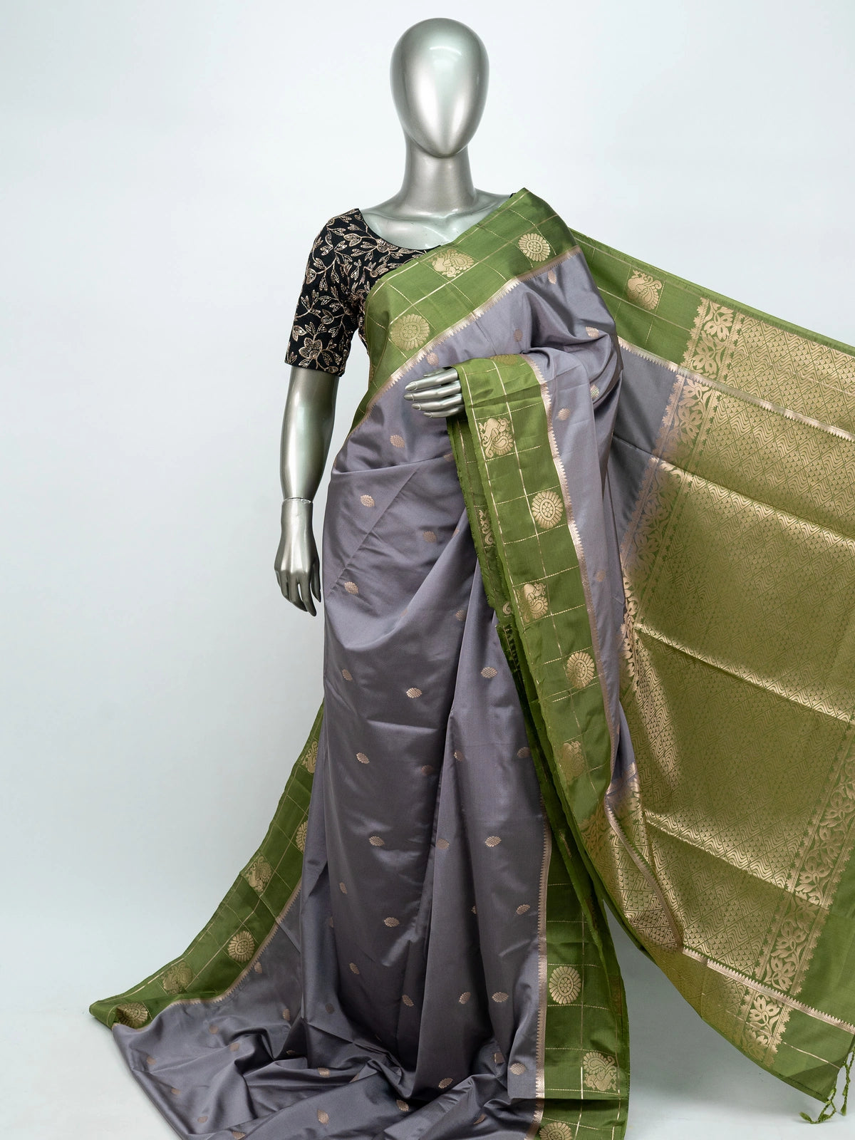 Grey semi silk saree with green contrast gold zari border and floral pallu