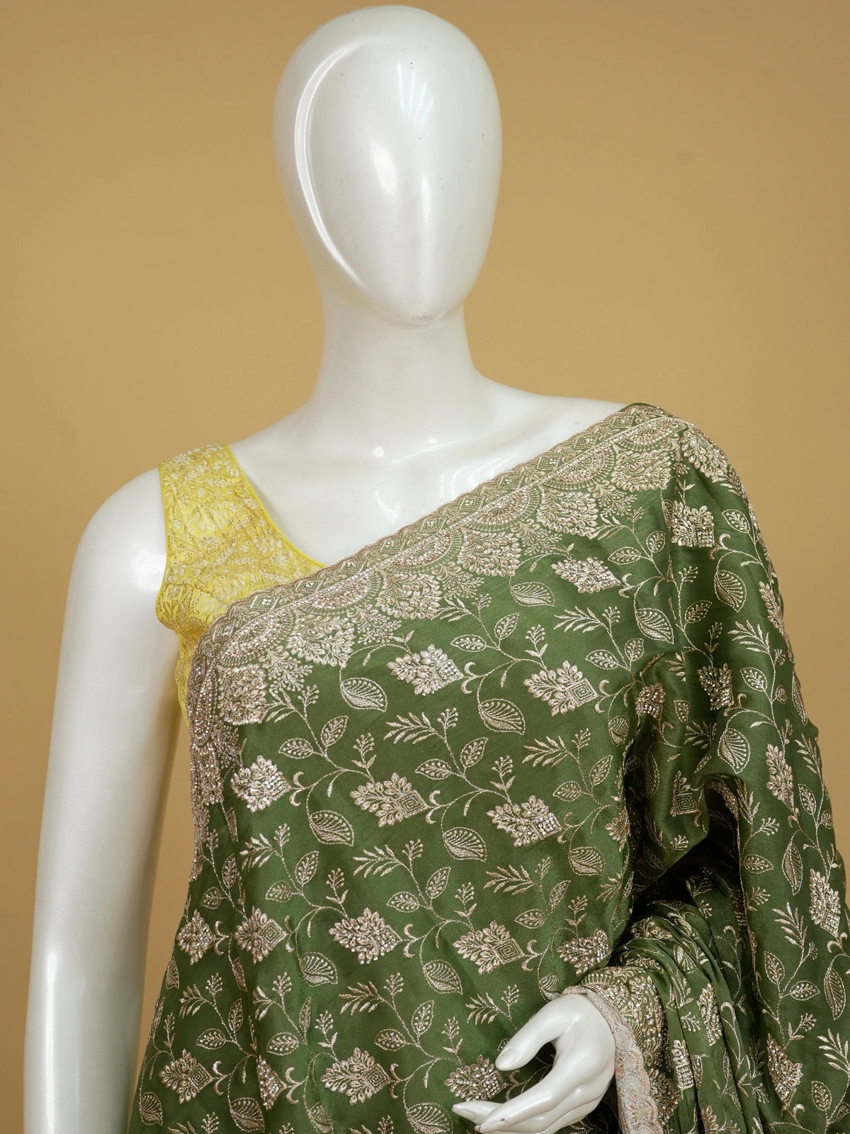 Mehendi green designer saree with gold floral zari embroidery and contrast yellow blouse
