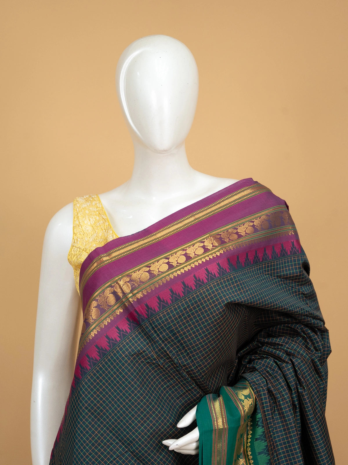 Teal green and magenta Chettinad cotton saree with checked body and contrast gold zari border