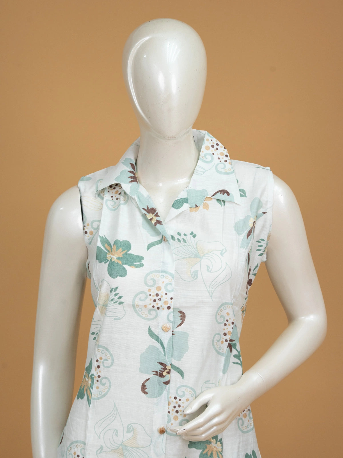 White floral printed cotton co-ord set with sleeveless collared kurti and matching straight pants