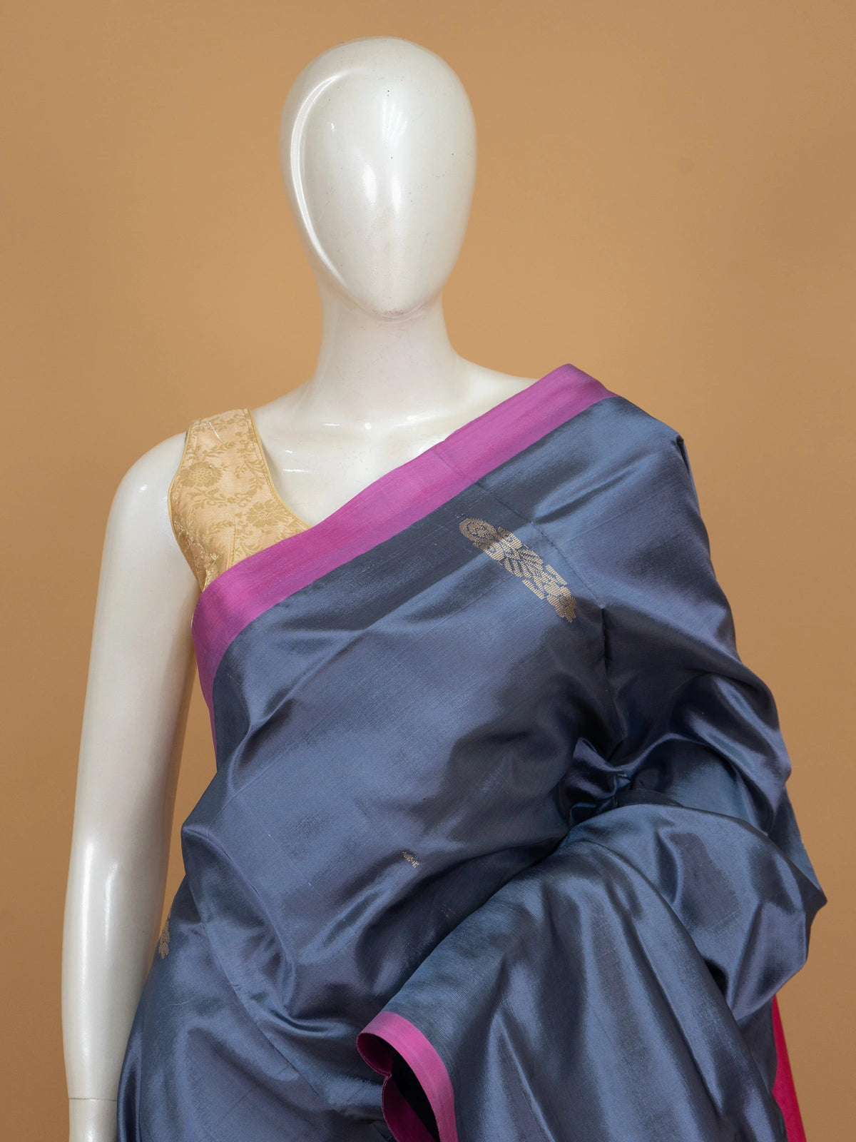 Grey-blue Banana Silk saree with contrast pink zari border and pallu