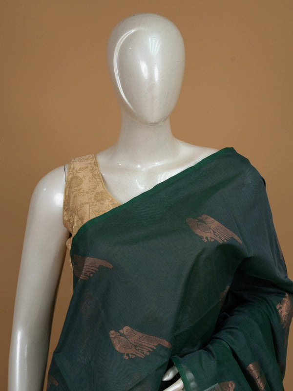 Bottle green silk cotton saree with copper zari bird motifs and contrast zari border