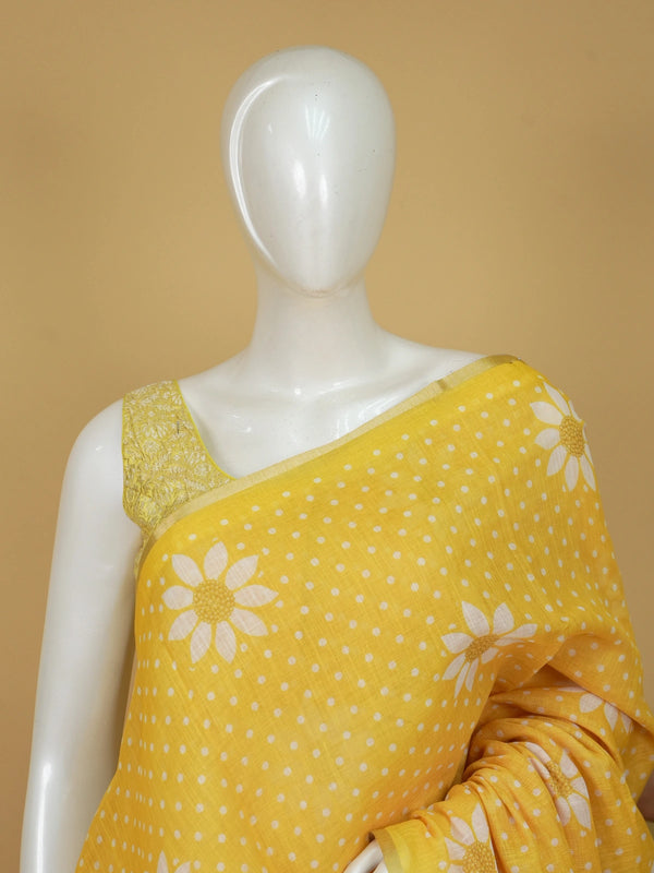 Yellow and white polka dot linen cotton saree with daisy floral prints and slim golden border
