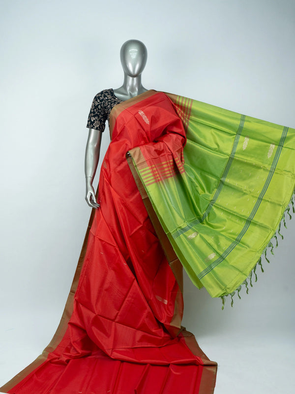 Red Banana silk saree with lime green contrast pallu, gold-copper zari border and woven buttas