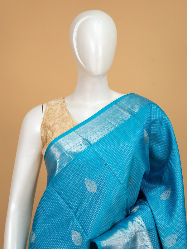Peacock blue pure Kanchipuram silk saree with silver zari checks, paisley butis and elephant-motif border