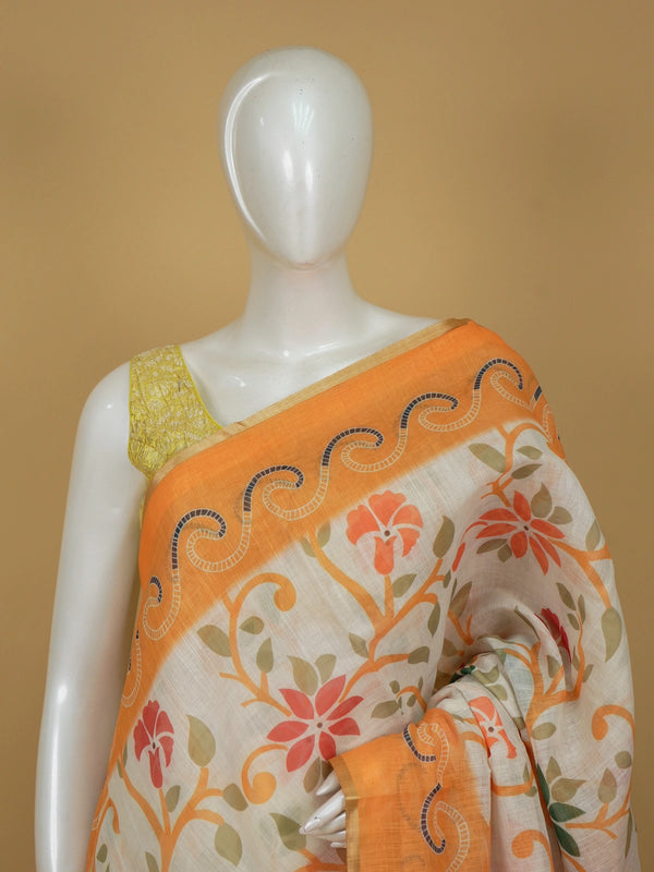 Cream linen cotton saree with orange floral print and paisley border