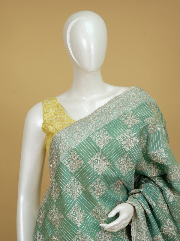 Sea green designer organza saree with silver zari and sequin paisley embroidery and embellished border