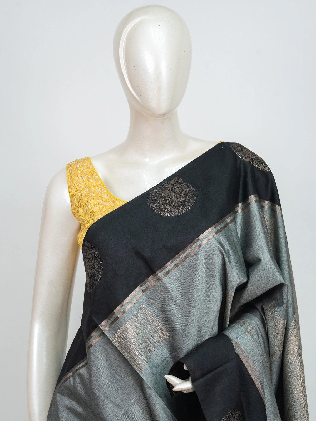 Grey and black Kanchipuram fancy silk saree with copper-gold zari butta motifs and contrast zari border