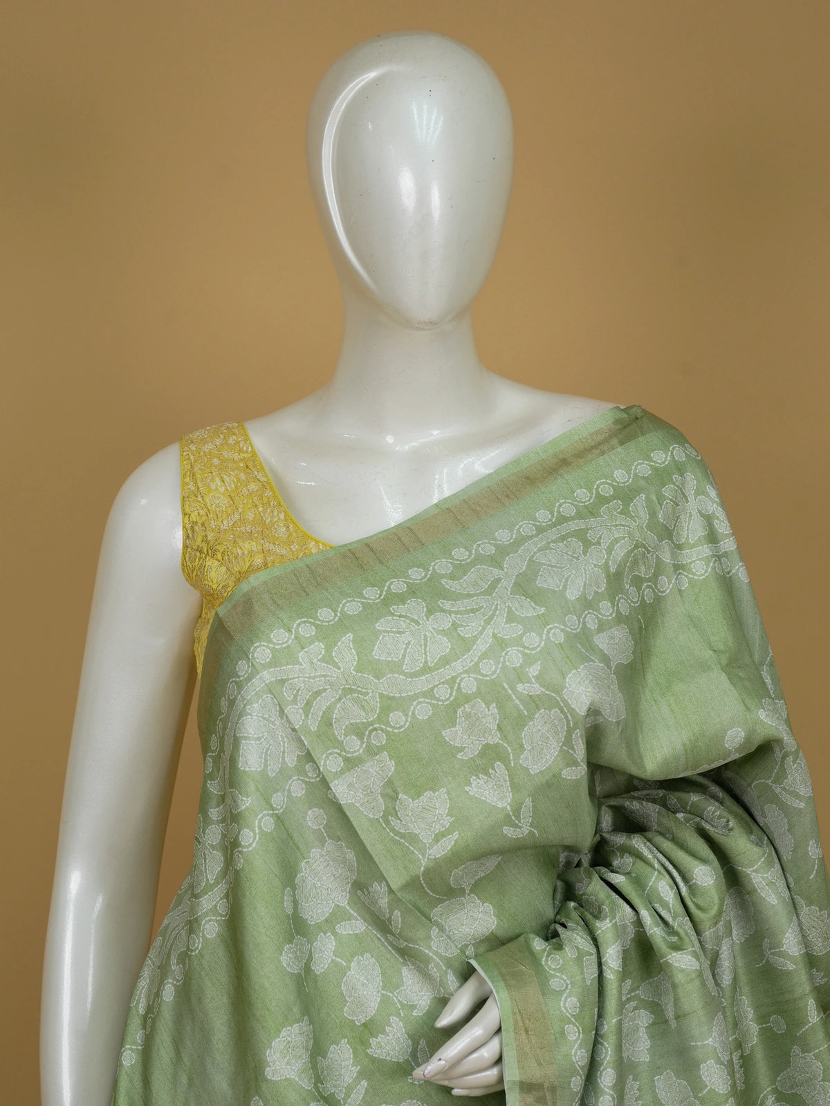Sage green and white floral Dola silk saree with woven motifs and zari border
